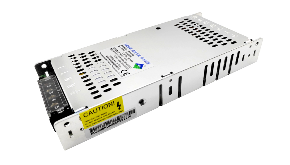 Metal enclosed DC power supply with vented top and side panels, featuring a terminal block at the front and caution label on the side.