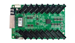 NV7516 1 - LED Controller Card Store for LED Display Module, LED Display Parts Green development PCB with many black edge connectors arranged in two zigzag rows, plus a USB port and a metal module on the left for expansion