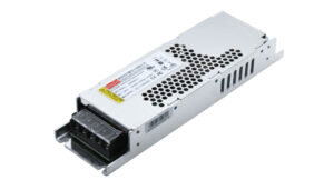 Metal enclosed DC power supply module with a 4-pin terminal block at the front and perforated cooling cover (industrial electronics).