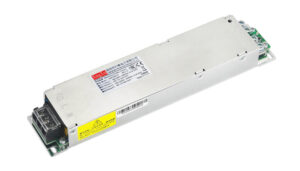 Metal enclosed switching power supply module with terminal blocks at one end for electrical connections; used in industrial equipment