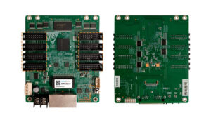 Front and back view of a green development board with a USB-C/USB-A port, Ethernet jack, and multiple 40-pin connector sockets on both sides; labeled regions and a central processor.