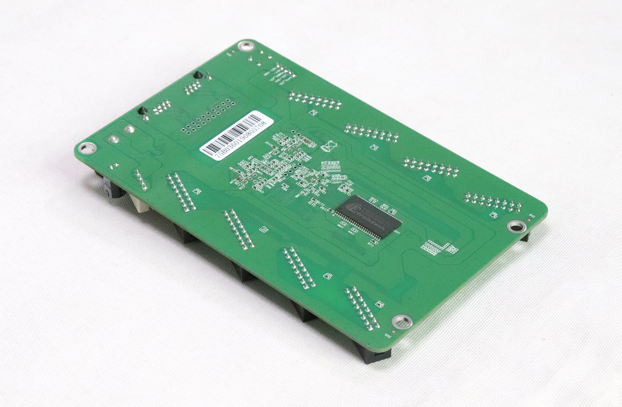 Angled rear view of a 5A-75B receiving card and its mounting holes.